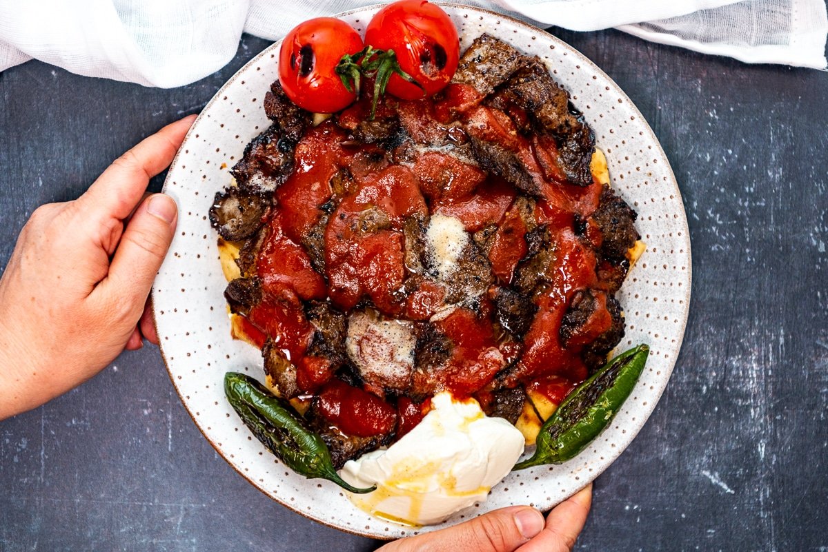 An image of a completed Iskender Kebap dish.